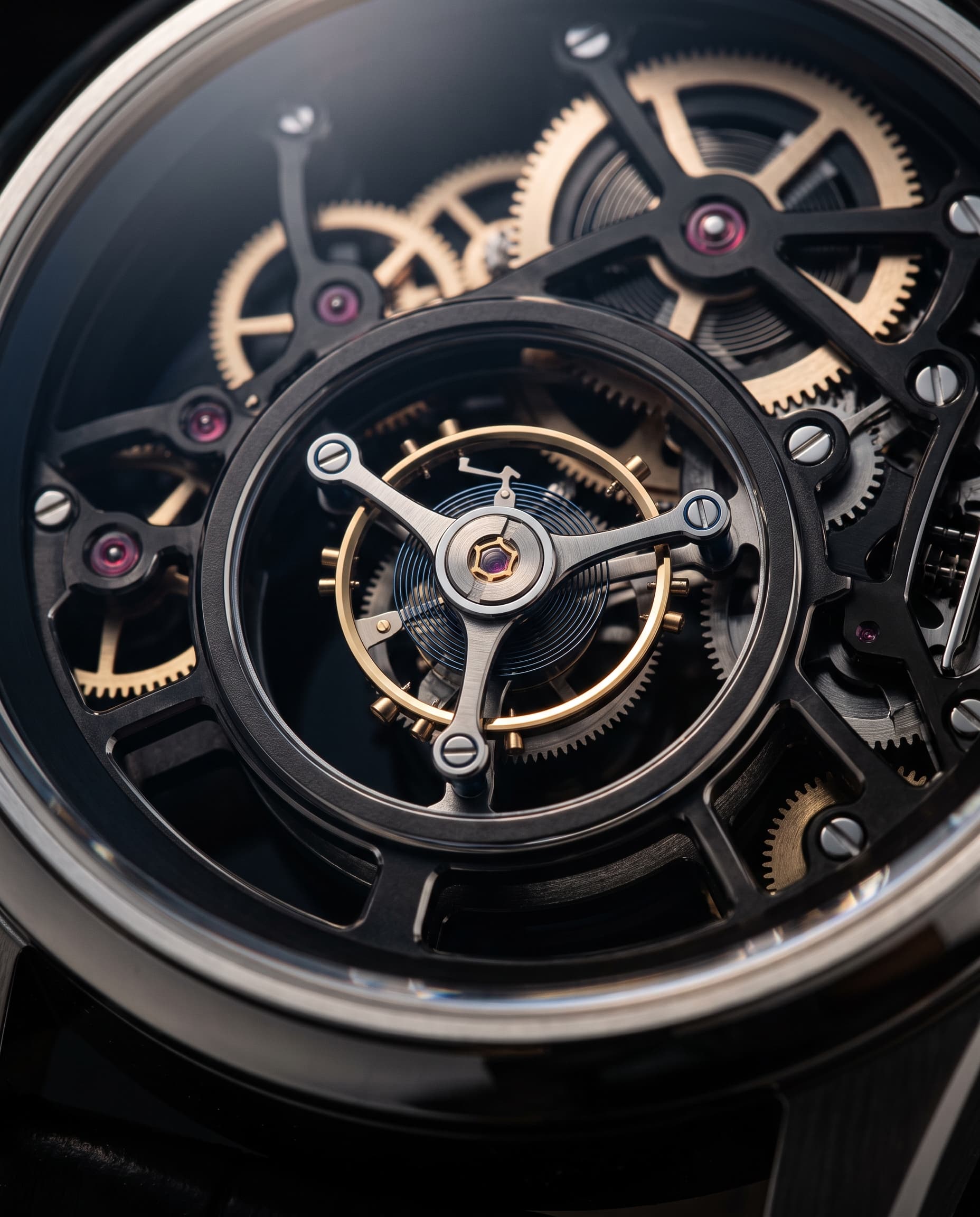 Macro view of the flying tourbillon cage turning in open air, with no bridge above it